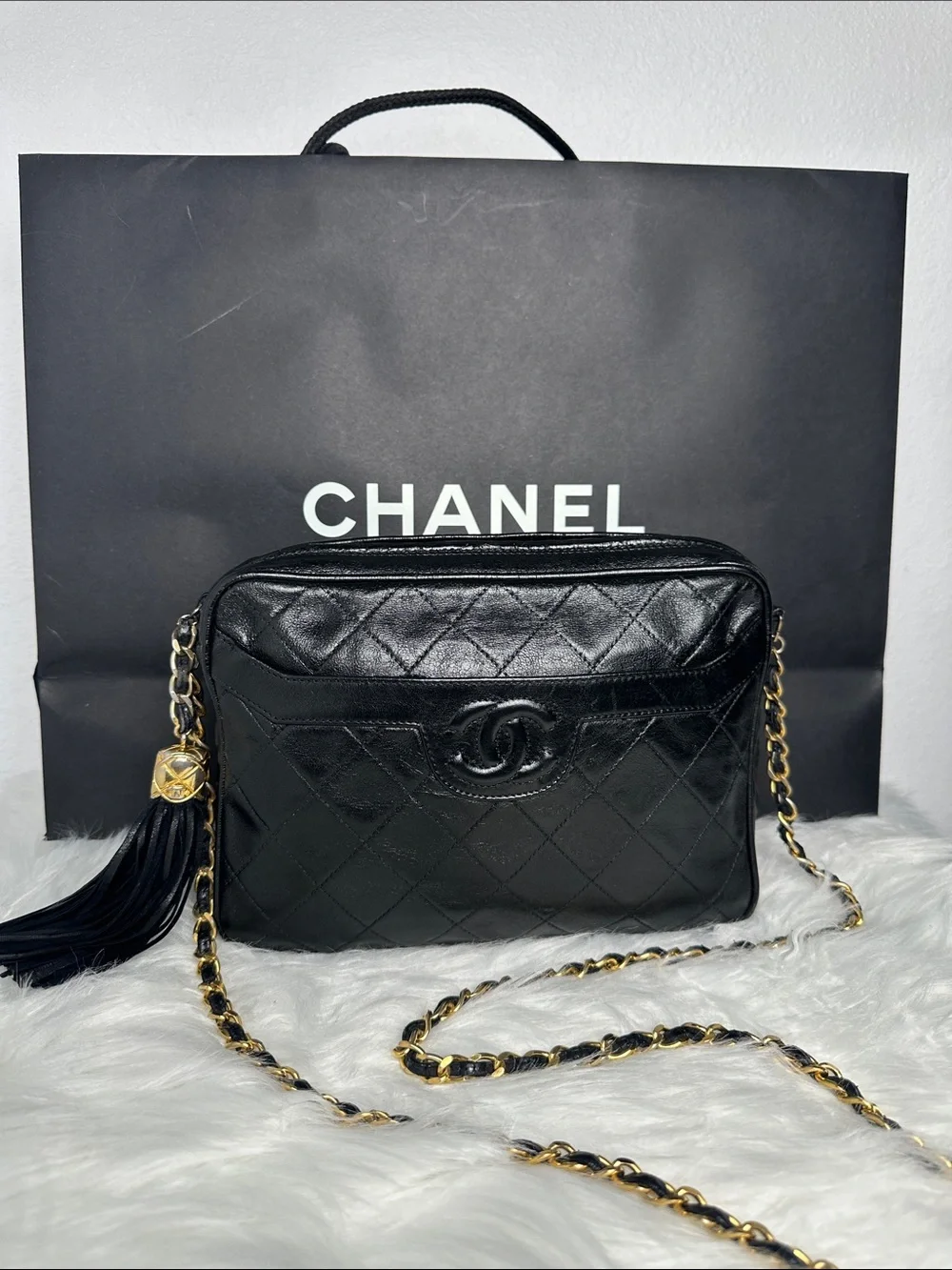 CHANEL Black Quilted Lambskin Crossbody with Tassel and Chain